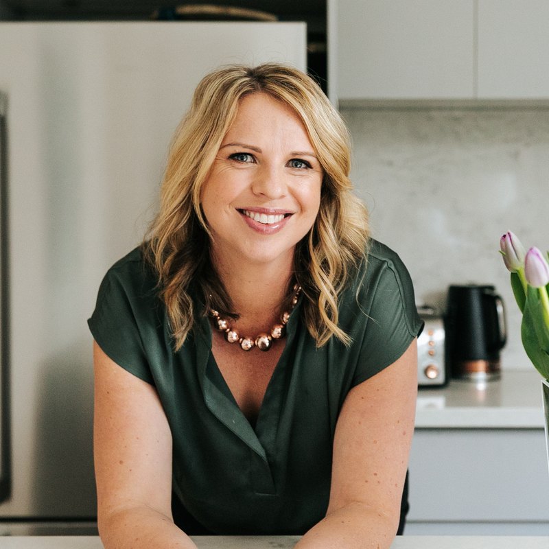 Georgie Beames, Registered Psychologist and Coach, in her kitchen